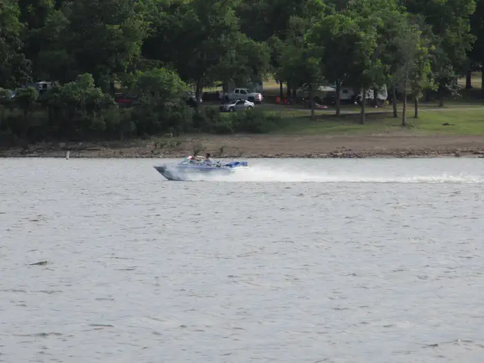 Boat along north shoreline - Blue Bill