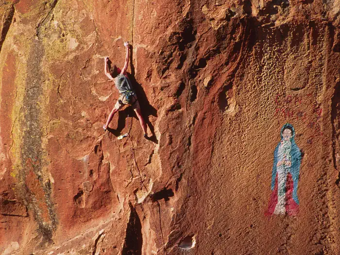 Climber and Pictograph in Penitente Canyon